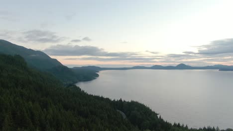 Lake-with-mountains-and-green-trees-2