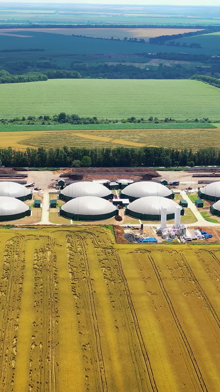 Big gas production factory aerial shot. Modern gas producing technology tanks