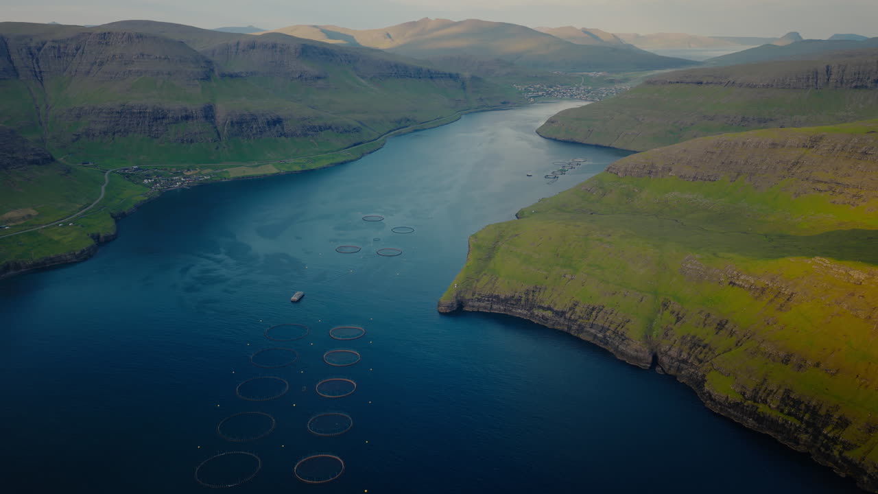 Aerial View of a Fjord with Aquaculture Fish Farms in the Faroe Islands