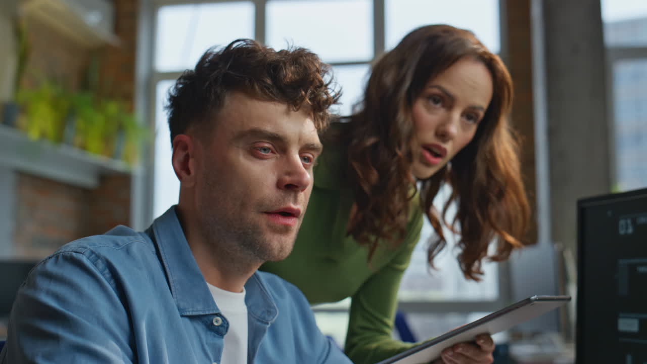 Business people looking computer discussing strategy at office coworking closeup