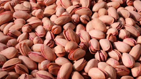 close up of a pile of pistachios