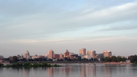 harrisburg, pennsylvania - july 4, 2022: a view of the harrisburg city skyline from across the susquehanne river in the evening light