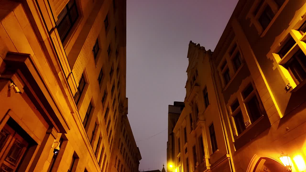 An old town square with old houses on both sides. Riga Latvia