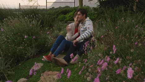 caucasian couple spending time in a garden