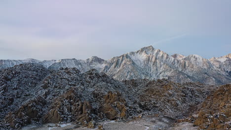 Rugged-Terrain-Mountains-Covered-With-Snow.-Aerial-Shot