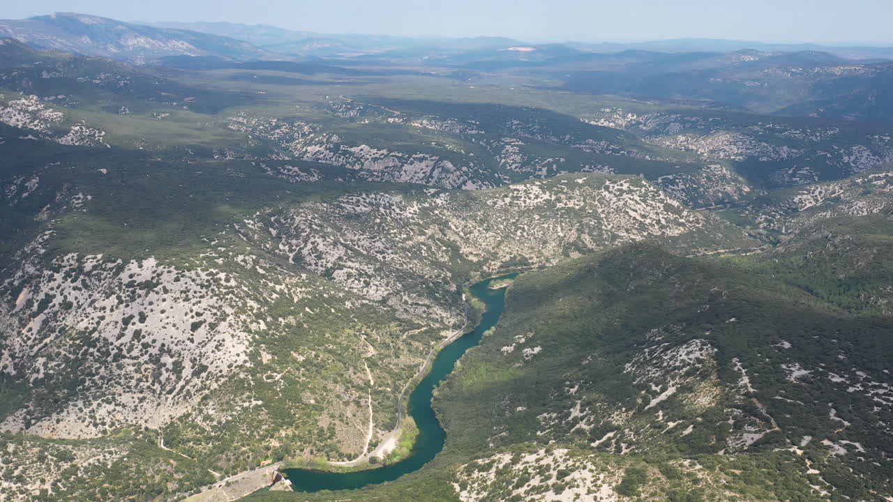 Electric dam in the Herault river and gorges France aerial drone shot global