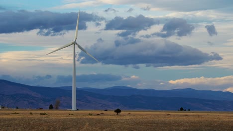 wind turbine against a background of moving clouds