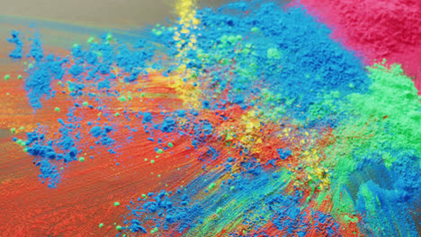 Video-of-multi-coloured-powders-with-copy-space-on-black-background