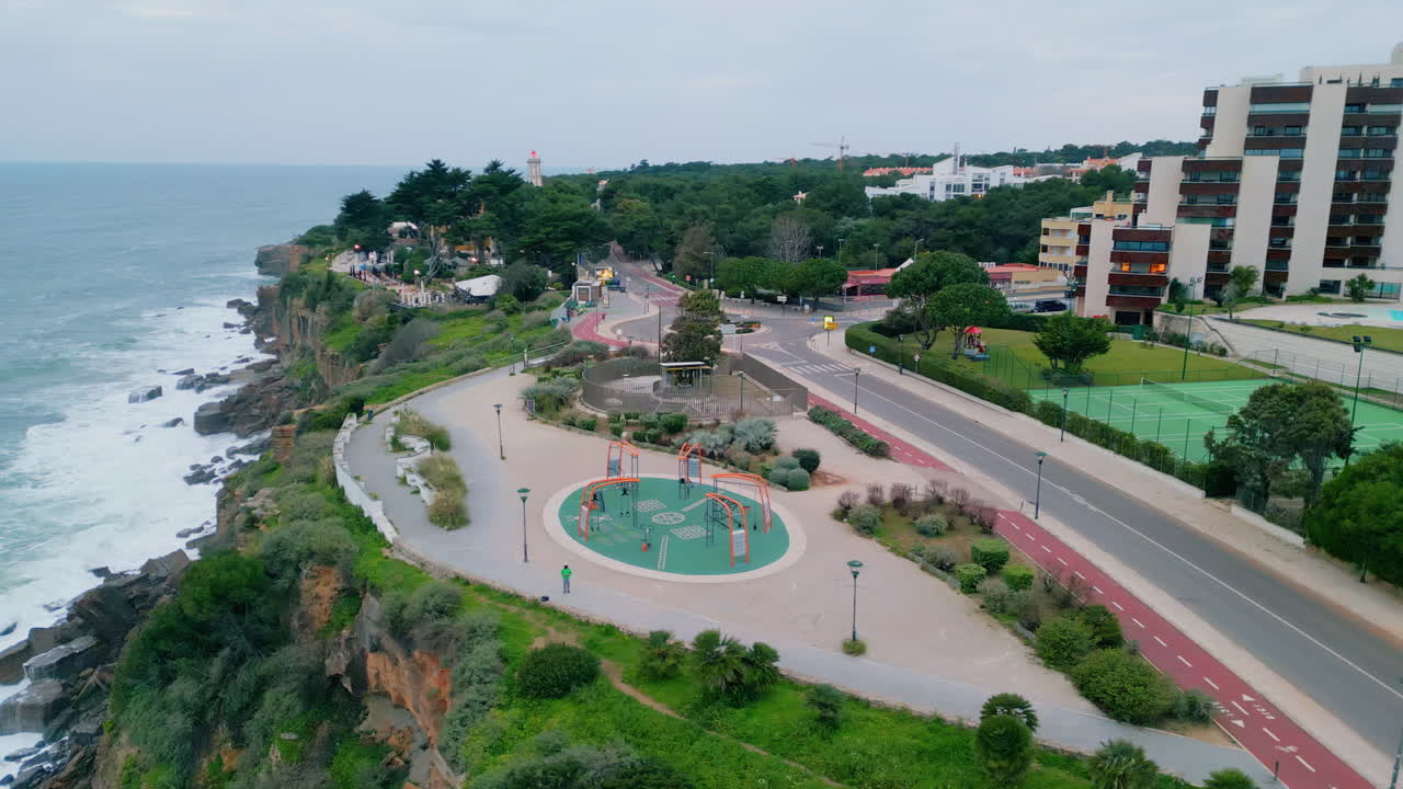 Aerial cozy hotel sea shore cloudy day. Place for relax vacation with ocean view