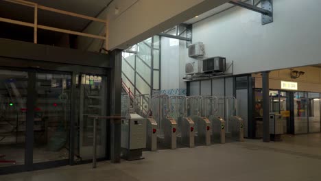 empty and silent amsterdam zuid metro and train station entrance, amsterdam, netherlands