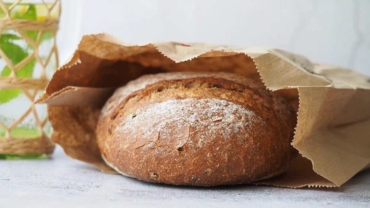 Freshly Baked Sourdough Bread in a Paper Bag