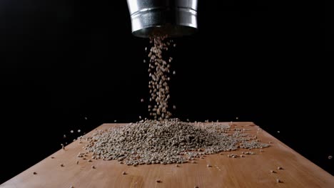 the coffee beans are poured onto the table