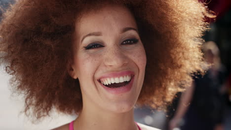 Slow-Motion-Portrait-of-funky-happy-mixed-race-woman-smiling