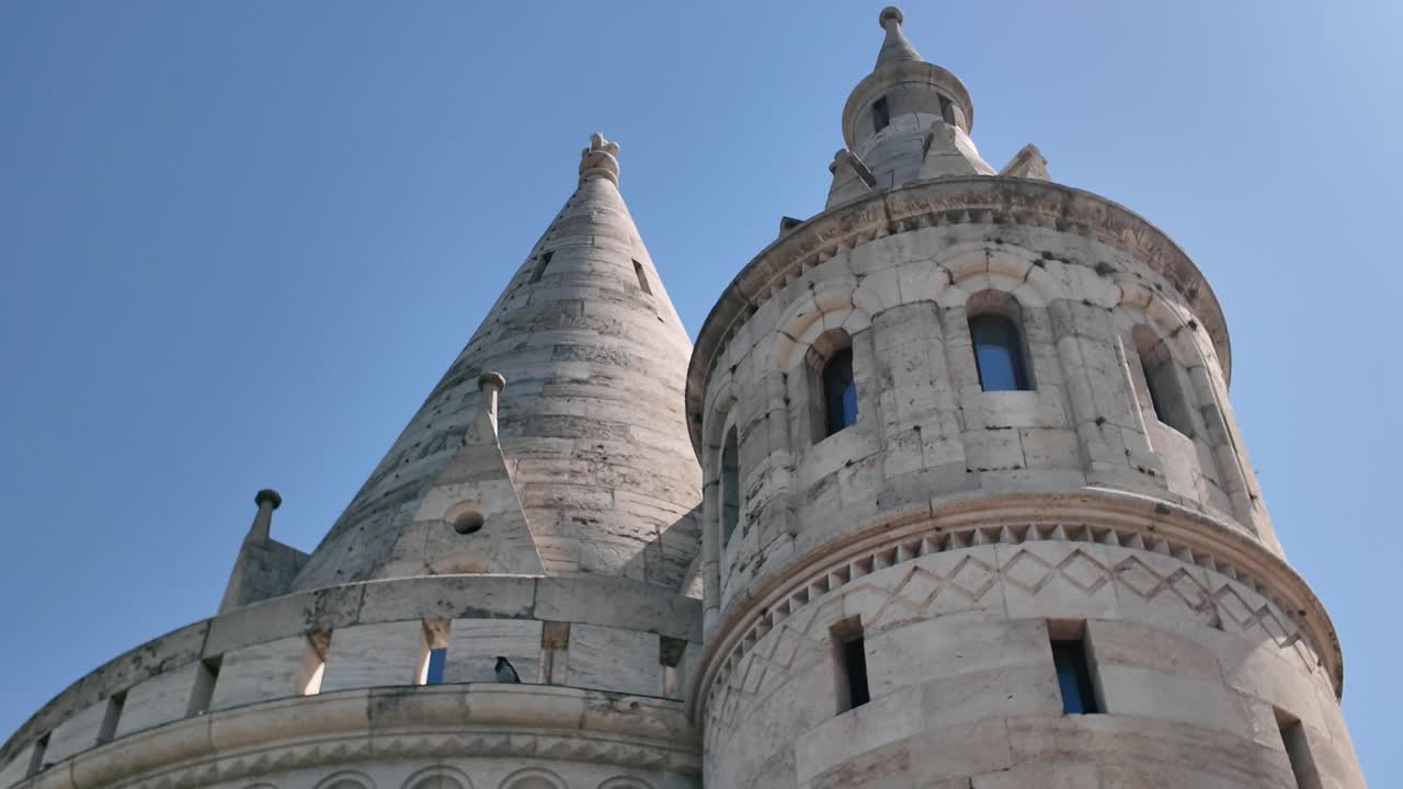 Elegant medieval-inspired architectural details of Fisherman's Bastion under a clear blue sky