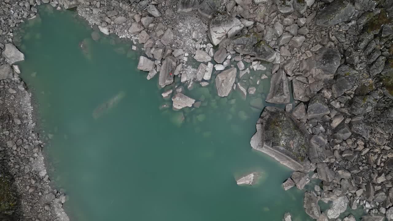 Top up shot of a blue lake near the Latefoss waterfall area, Norway