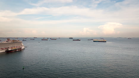 container ships anchored in front of singapore port. aerial forward and copy space