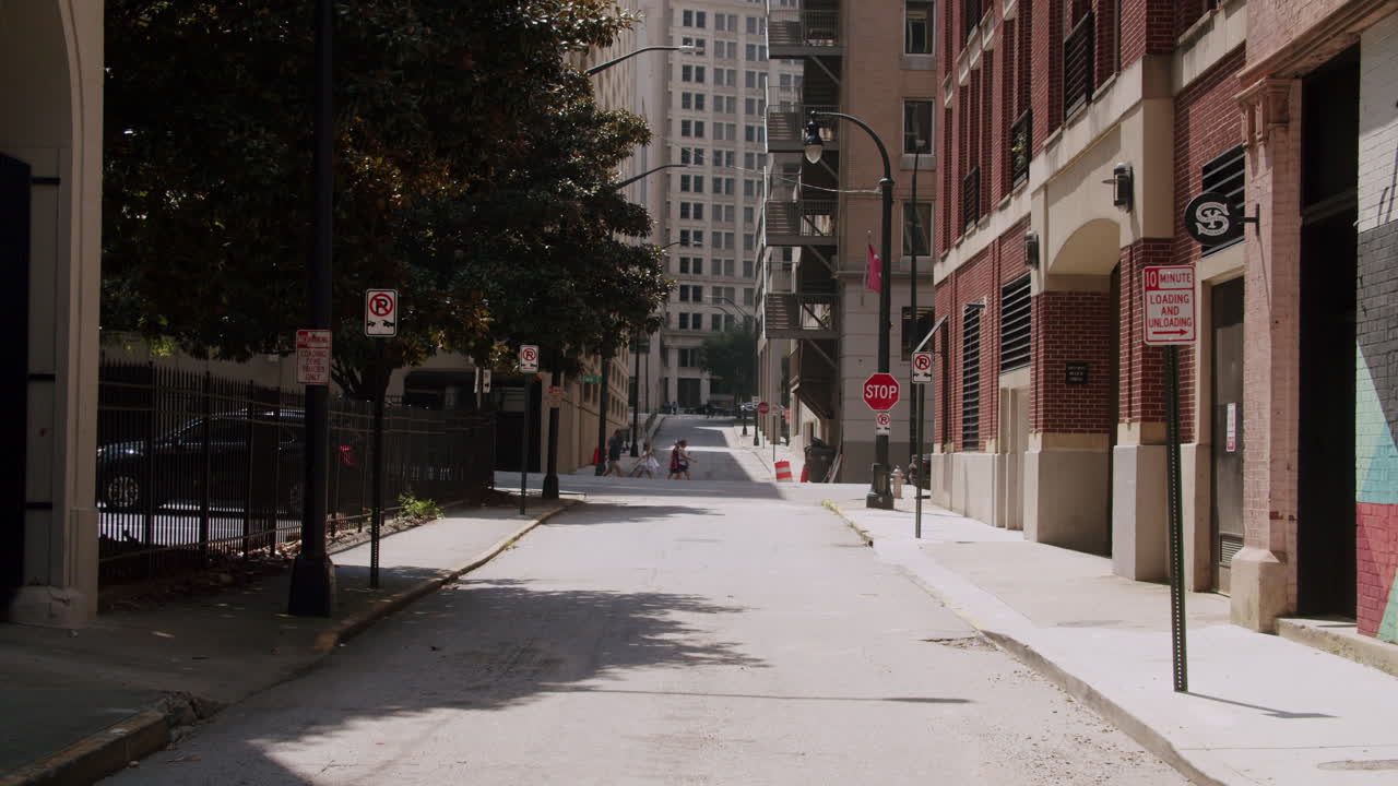 Urban Alley Scene with People and Parking Signs