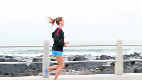 pretty young determined woman running