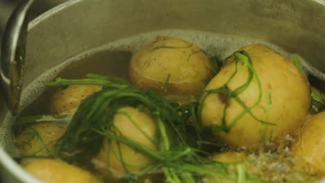 fresh potatoes cooking in slow motion