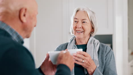 Senior-couple,-coffee-and-kitchen-in-the-morning