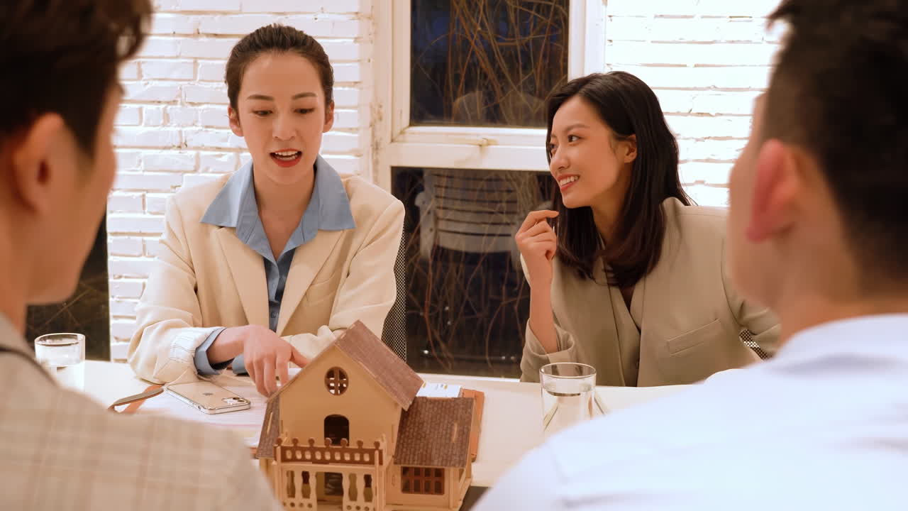 Discussion With Business meetings of real estate brokers Agent and company presidents to select a model to build a housing estate, signing a contract for Insurance protecting house