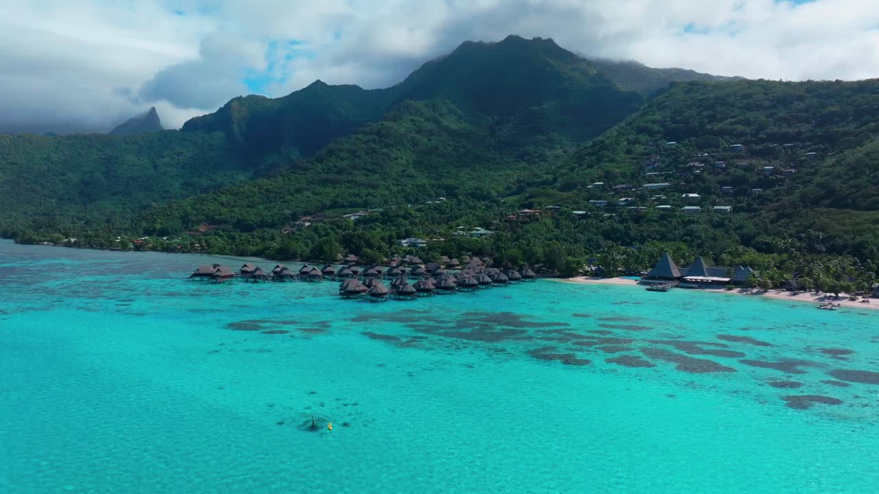 Sofitel Kia Ora Resort Moorea Toatea Lookout French Polynesia aerial drone snorkel swim turquoise bungalow blue water coral reef blue sky cloud layer mtns Tema'e Public Beach Beach forward pan up