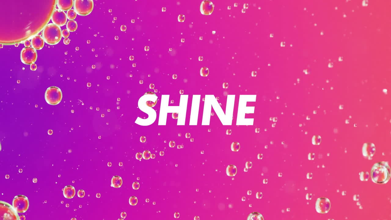 Animation of shine text over purple shapes and bubbles