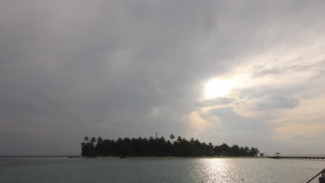 timelapse of the sun rising over a maldives island