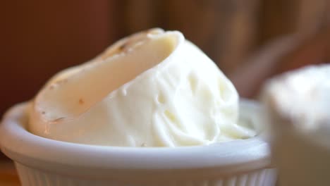 close up of a scoop of white ice cream