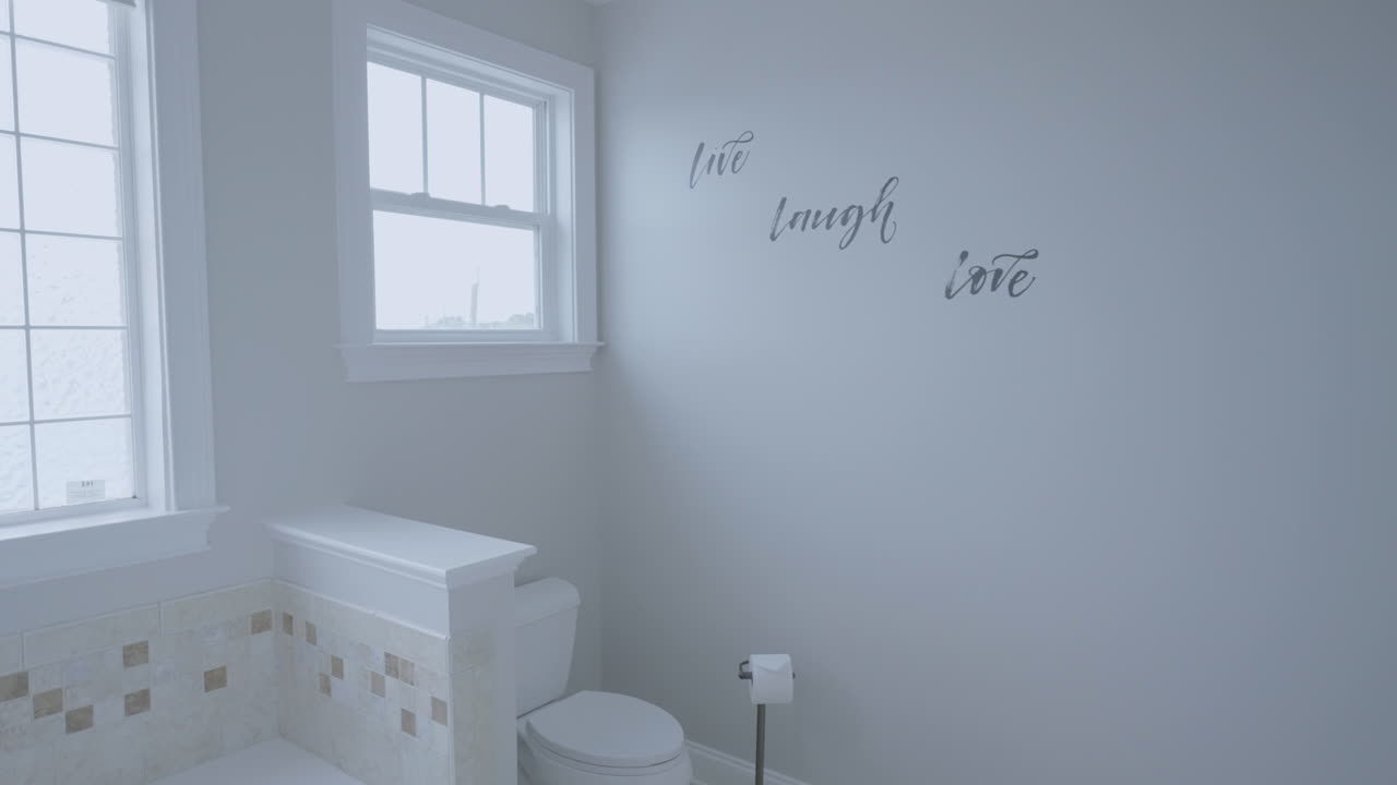 Bright white clean design bathroom toilet gimbal track in shot