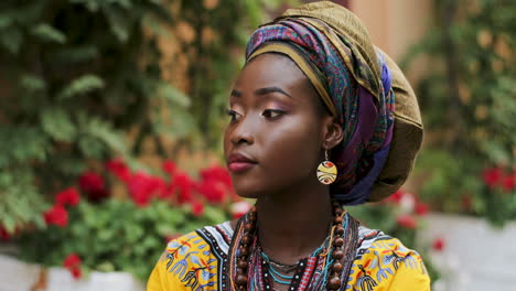 Portrait-Of-Theyoung-Attractive-And-Charming-Woman-In-The-Traditional-Outfit-Looking-To-The-Camera-And-Smiling