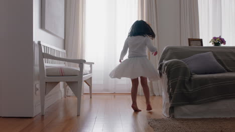 happy-little-ballerina-girl-practicing-ballet-dance-wearing-tutu-playing-pretend-game-at-home-enjoying-childhood-imagination-4k-footage