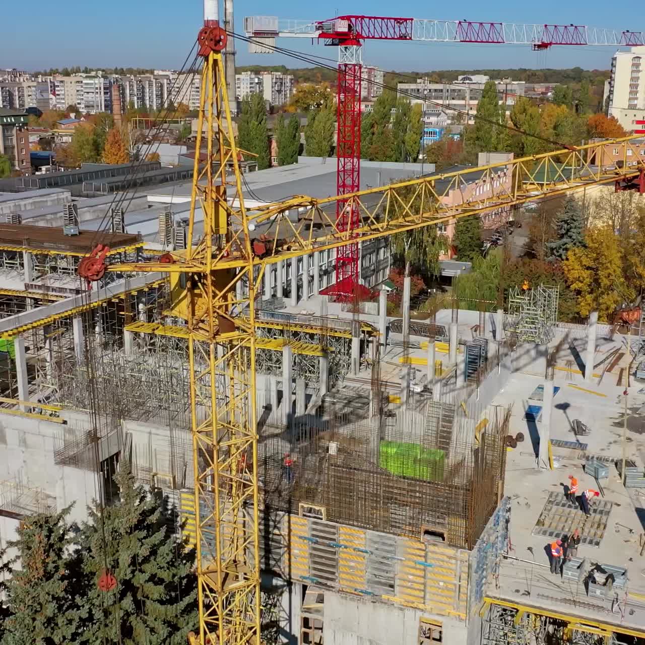 Cranes and building construction site