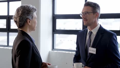 business people drinking coffee