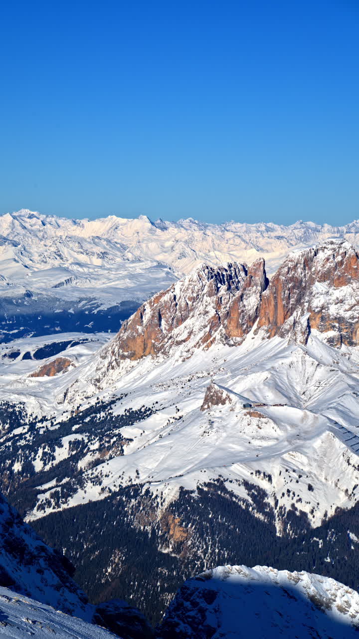 View of snow on the mountains in the Dolomites, Italy. Vertical