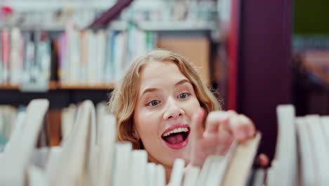 woman searching for books in a library