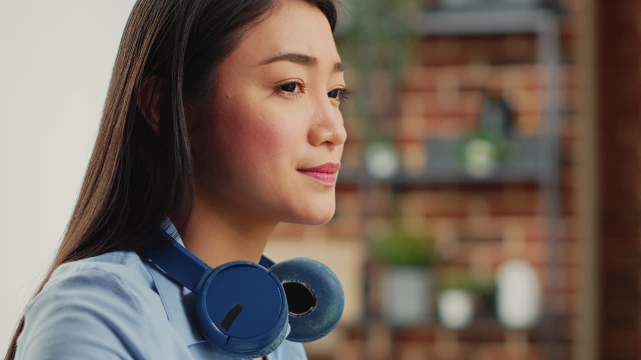 Young graphic artist using editing software on computer