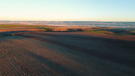 aerial view of farmland at sunrise/sunset