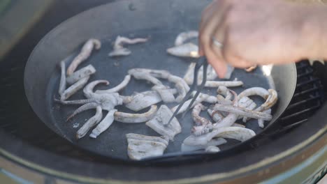 Frying-squid-in-frying-pan-outside