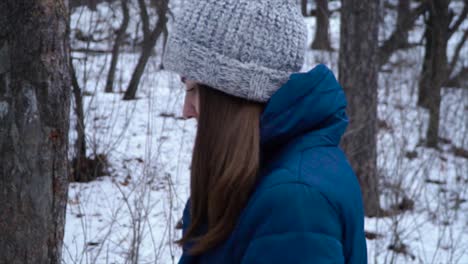 woman in winter forest