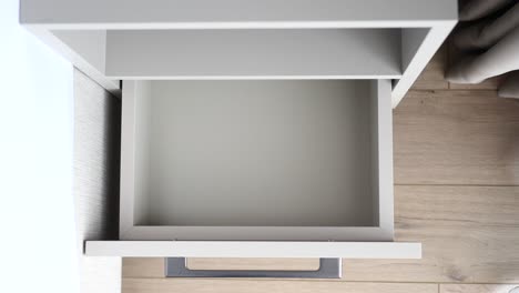 top view of a opened empty drawer