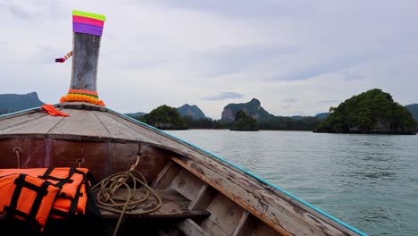 wooden boat journey through krabi's stunning waters