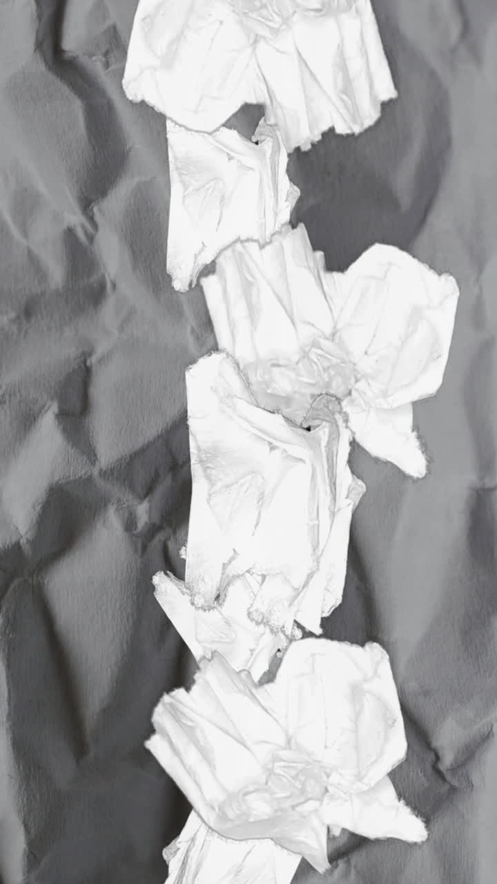 Abstract Background of Crumpled and Torn White Paper
