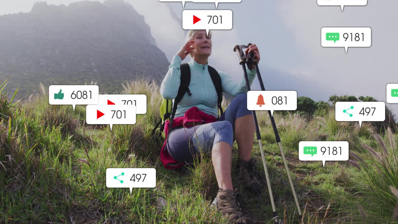 Woman hiker demonstrating social media marketing on mountain trail, showing animated icon overlays