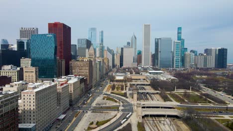 aerial footage captures skyline of downtown chicago from a bird's-eye view. the sprawling cityscape and towering skyscrapers are full of grandeur energy related to architecture, tourism and cityscapes