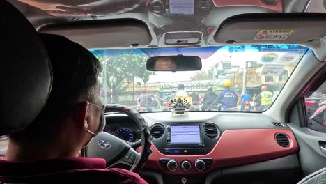 driver navigating busy hanoi streets