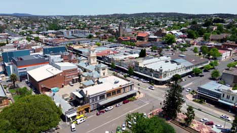 Drone-aerial-pan-shot-of-Goulburn-main-town-regional-CBD-location-town-travel-tourism-streets-road-cars-Goulburn-Southern-Tablelands-rural-NSW-Australia-4K