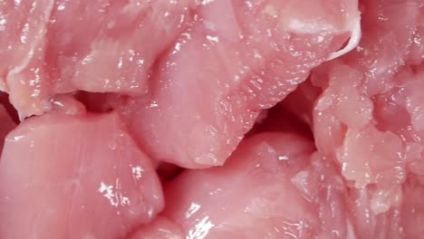 raw chicken breast pieces, close-up