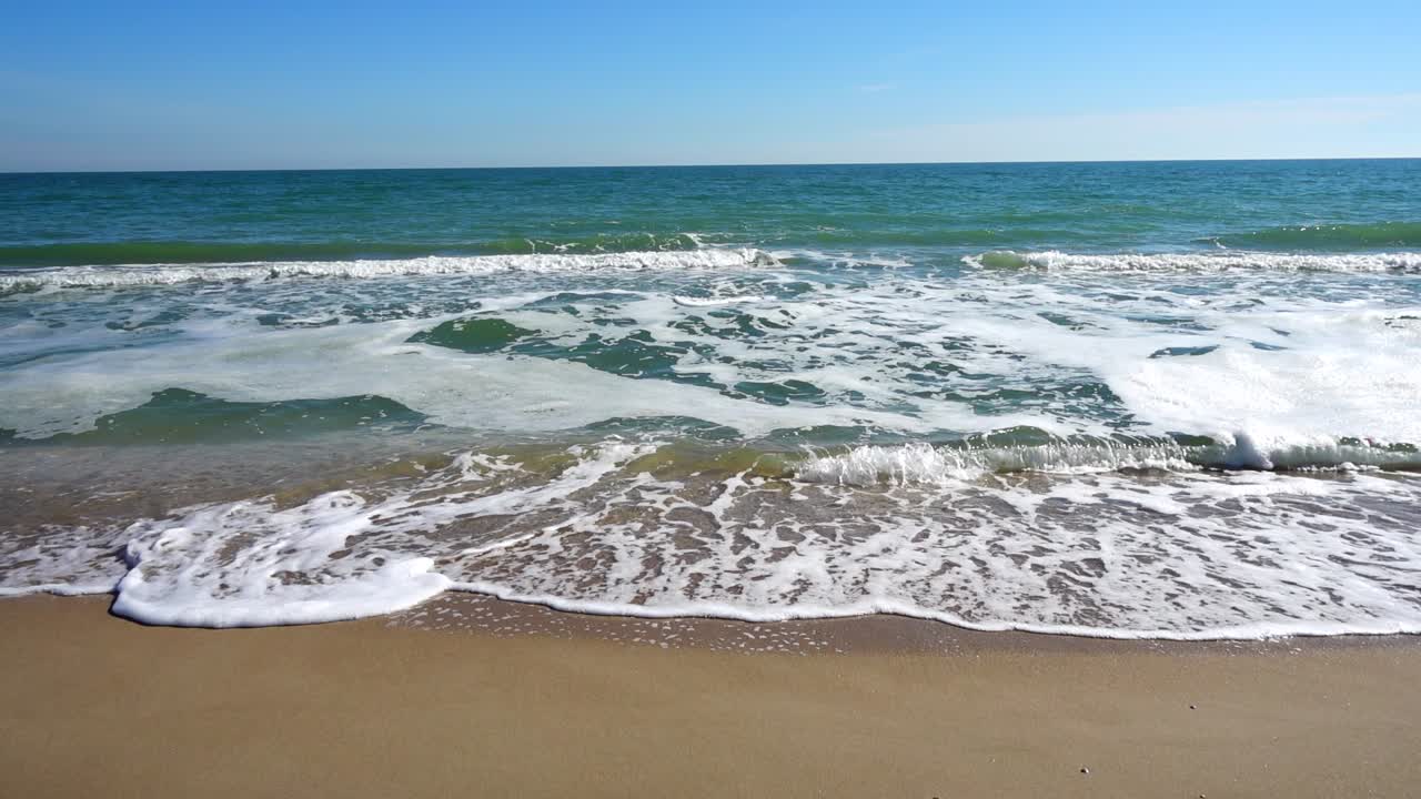 Sea and coast. Shooting on the beach. Slow motion