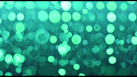 abstract green and teal bokeh light background